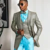 A Splashed gold & turquoise blue metallic jacquard double-breasted suit