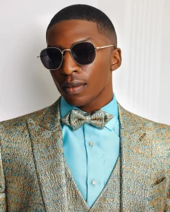 A Splashed gold & turquoise blue metallic jacquard double-breasted suit