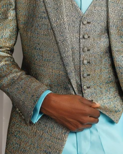 A Splashed gold & turquoise blue metallic jacquard double-breasted suit