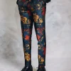 A Splashed Red, Yellow & Blue Floral Jacquard Gurkha Pant With a Side Metal Adjuster.