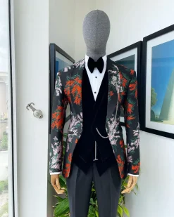 A “spring” orange, pink and green splashed floral layered front cut, shawl lapel tuxedo suit