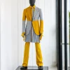 A “Square Shattered” yellow and broken tartan check in sapphire blue mix peak lapel suit