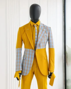 A “Square Shattered” yellow and broken tartan check in sapphire blue mix peak lapel suit
