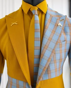 A “Square Shattered” yellow and broken tartan check in sapphire blue mix peak lapel suit