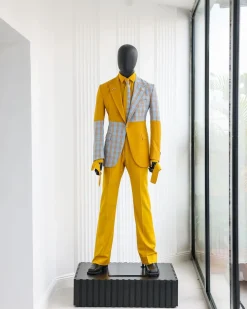A “Square Shattered” yellow and broken tartan check in sapphire blue mix peak lapel suit