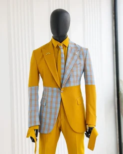 A “Square Shattered” yellow and broken tartan check in sapphire blue mix peak lapel suit