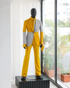 A “Square Shattered” yellow and broken tartan check in sapphire blue mix peak lapel suit