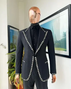 A steel black, seer sucker fabric, knitted, peak lapel suit