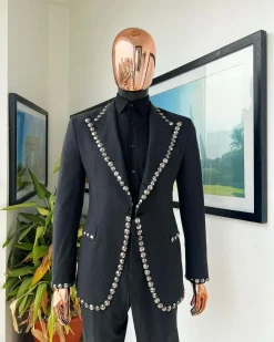 A steel black, seer sucker fabric, knitted, peak lapel suit