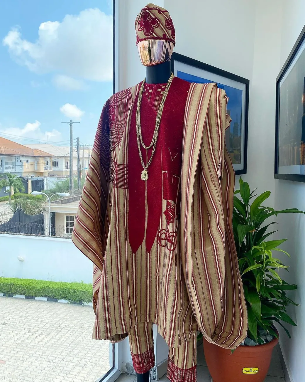 A Stripe champagne gold, cream, burgundy, aso oke regal agbada