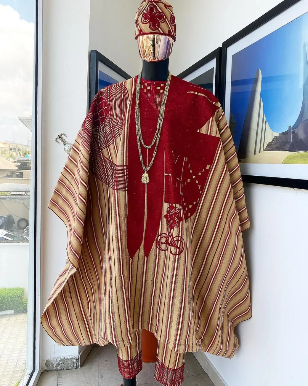 A Stripe champagne gold, cream, burgundy, aso oke regal agbada