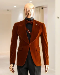 A Syrup Brown, Peak Lapel Tuxedo Suit With An Inner Slant Anchor.