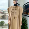 A Tan Brown, Connected Square Embroidery Design with Black Detailing Agbada