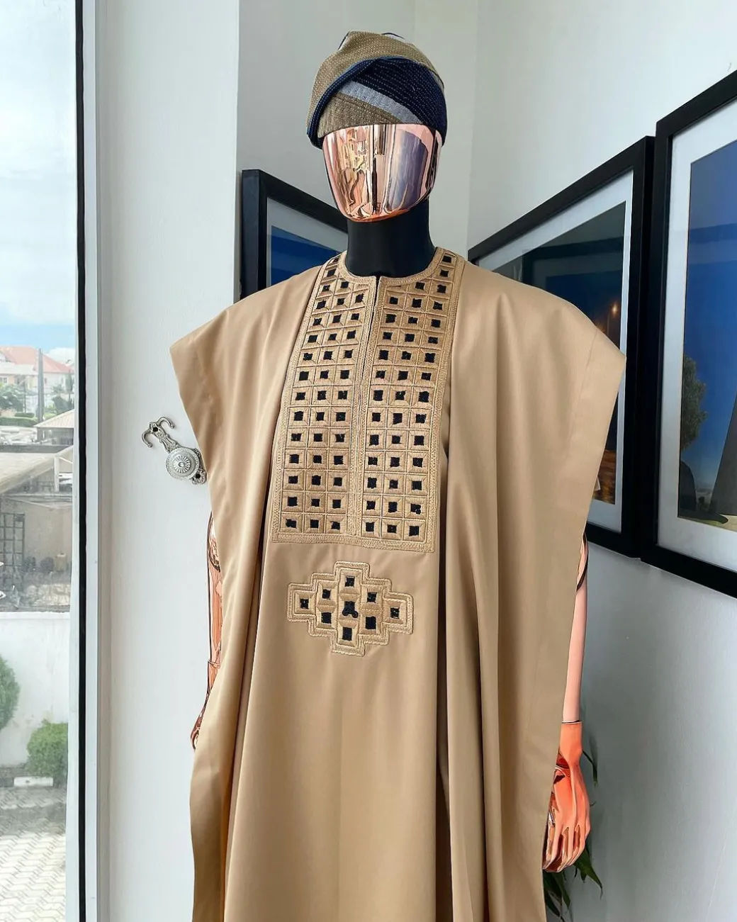 A Tan Brown, Connected Square Embroidery Design with Black Detailing Agbada