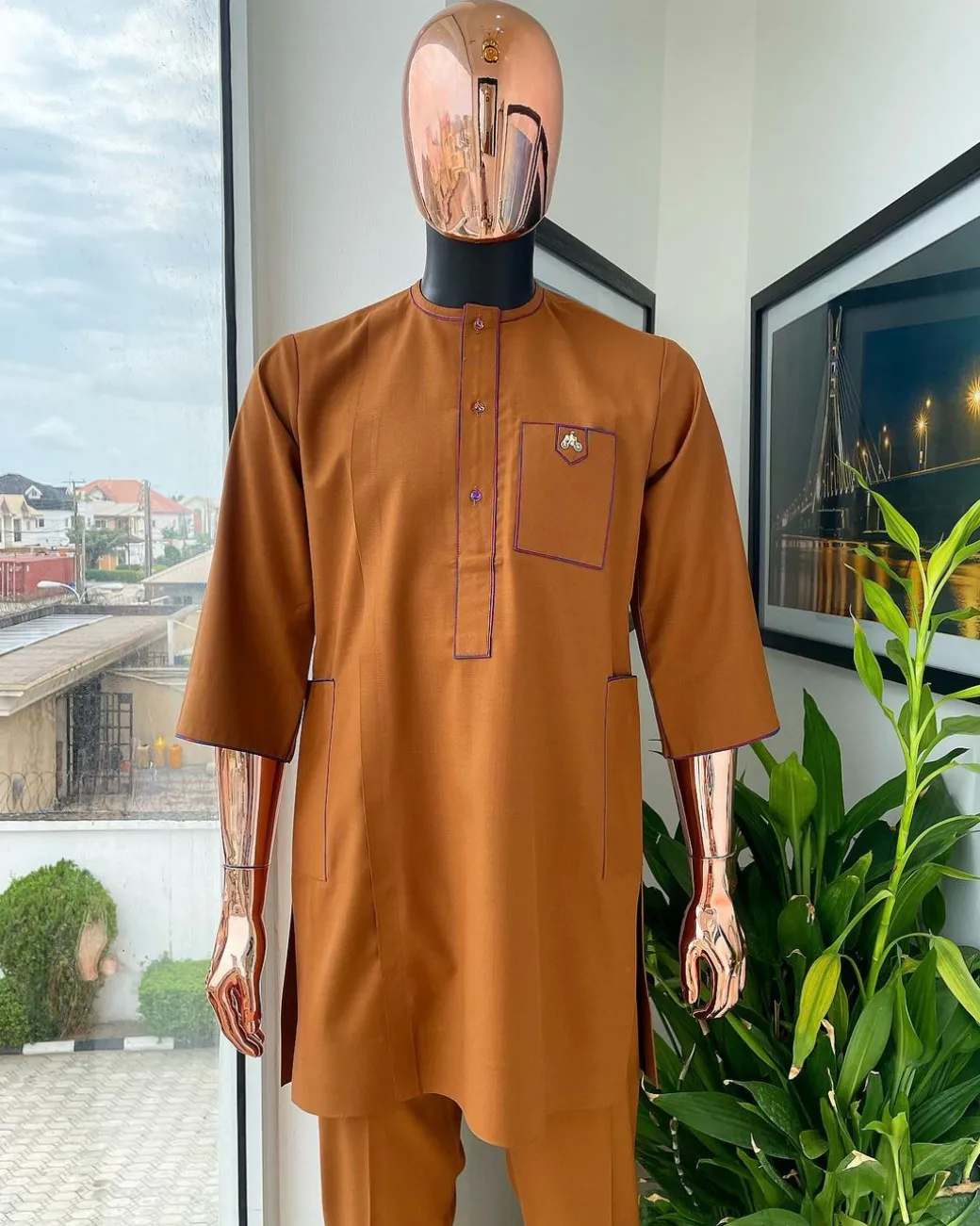 A Tawny brown, front flap, patch pocket, matching Swarovski buttons, paisley detailing African senator kaftan native.