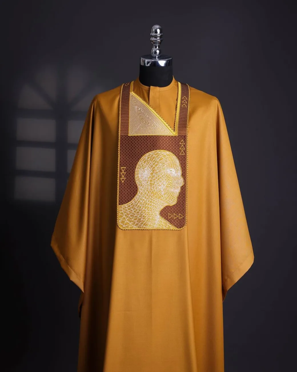 A Tawny brown, “Head Algorithm Mapping ” embroidery details agbada, 3/4 sleeve kaftan & sokoto