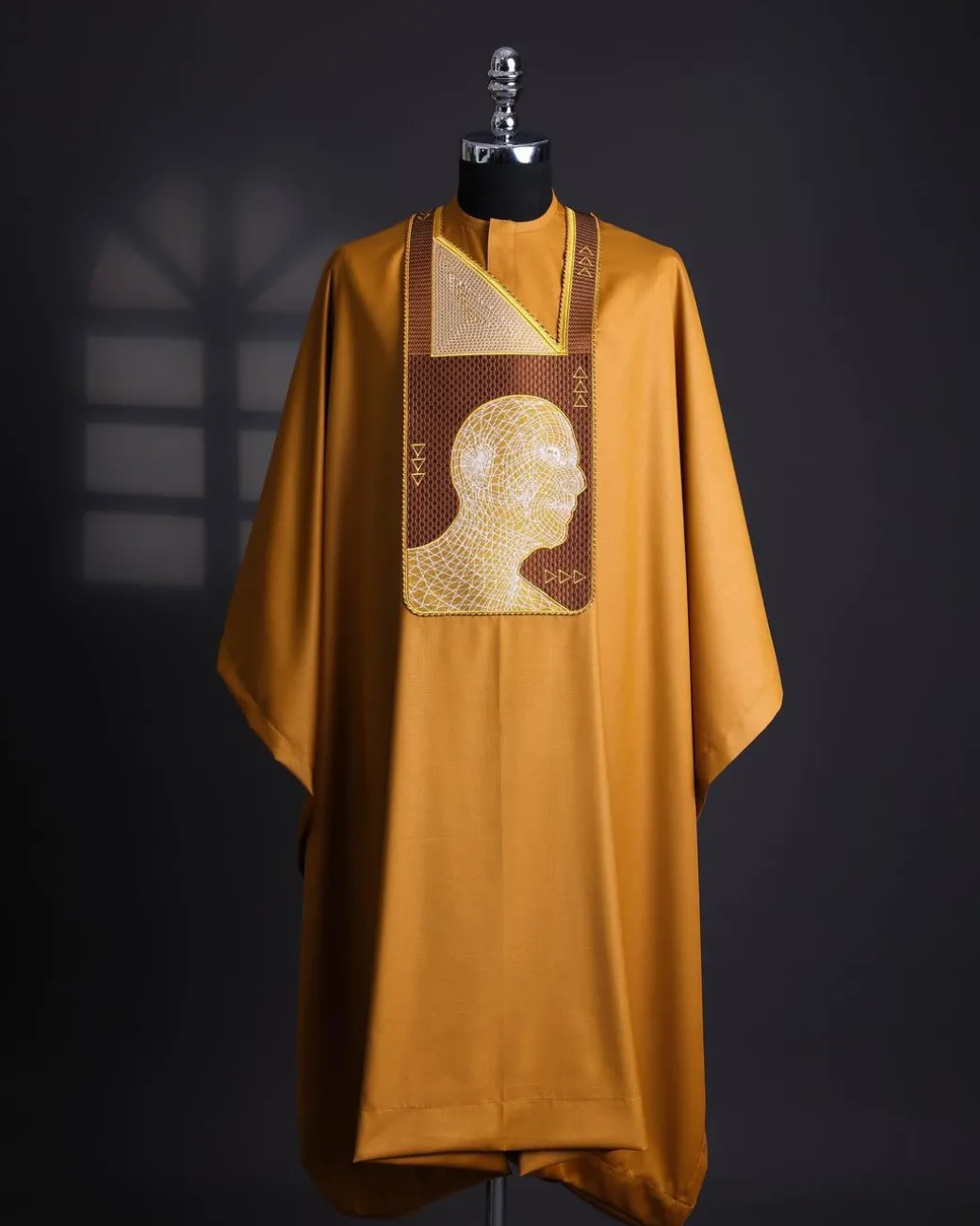 A Tawny brown, “Head Algorithm Mapping ” embroidery details agbada, 3/4 sleeve kaftan & sokoto