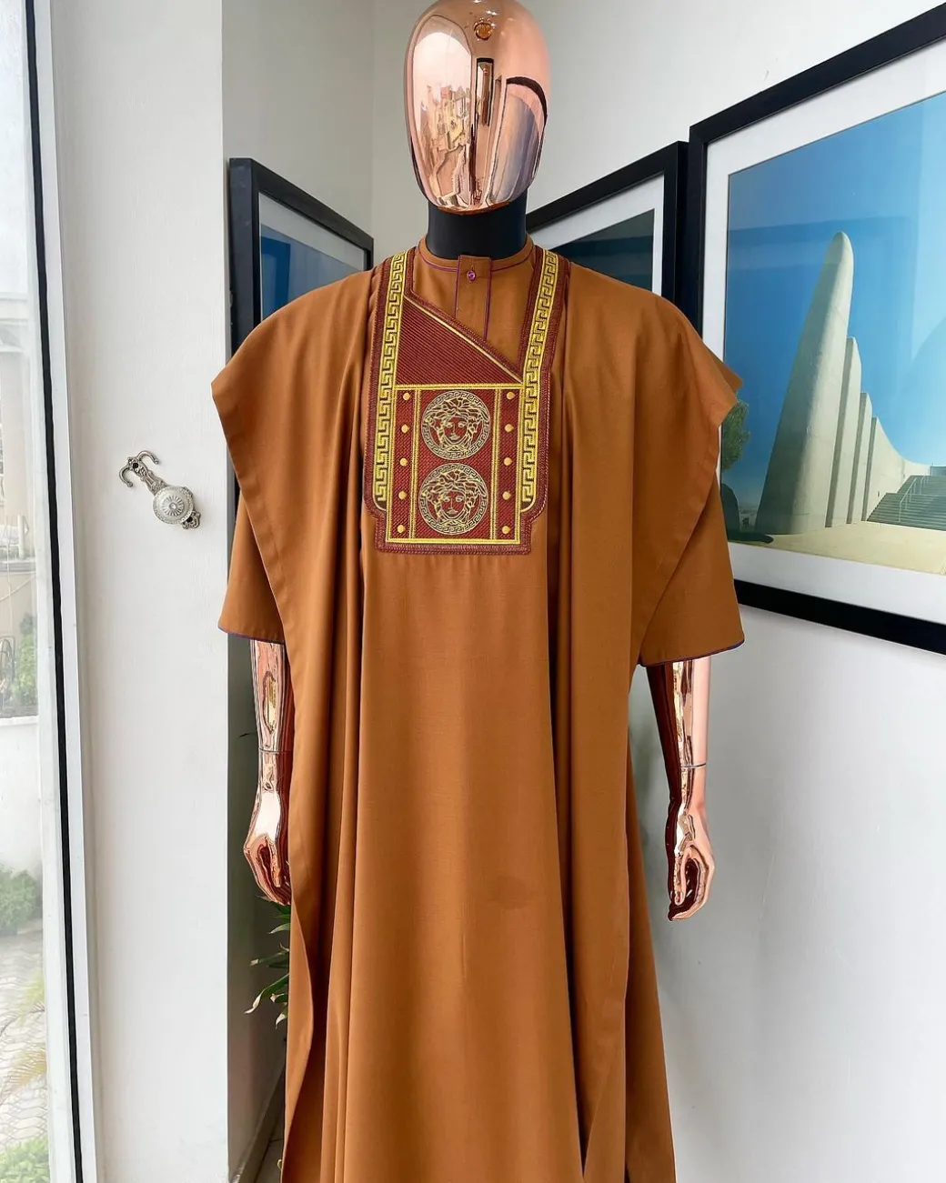 A Tawny brown, Medusa Head embroidery detailing Agbada