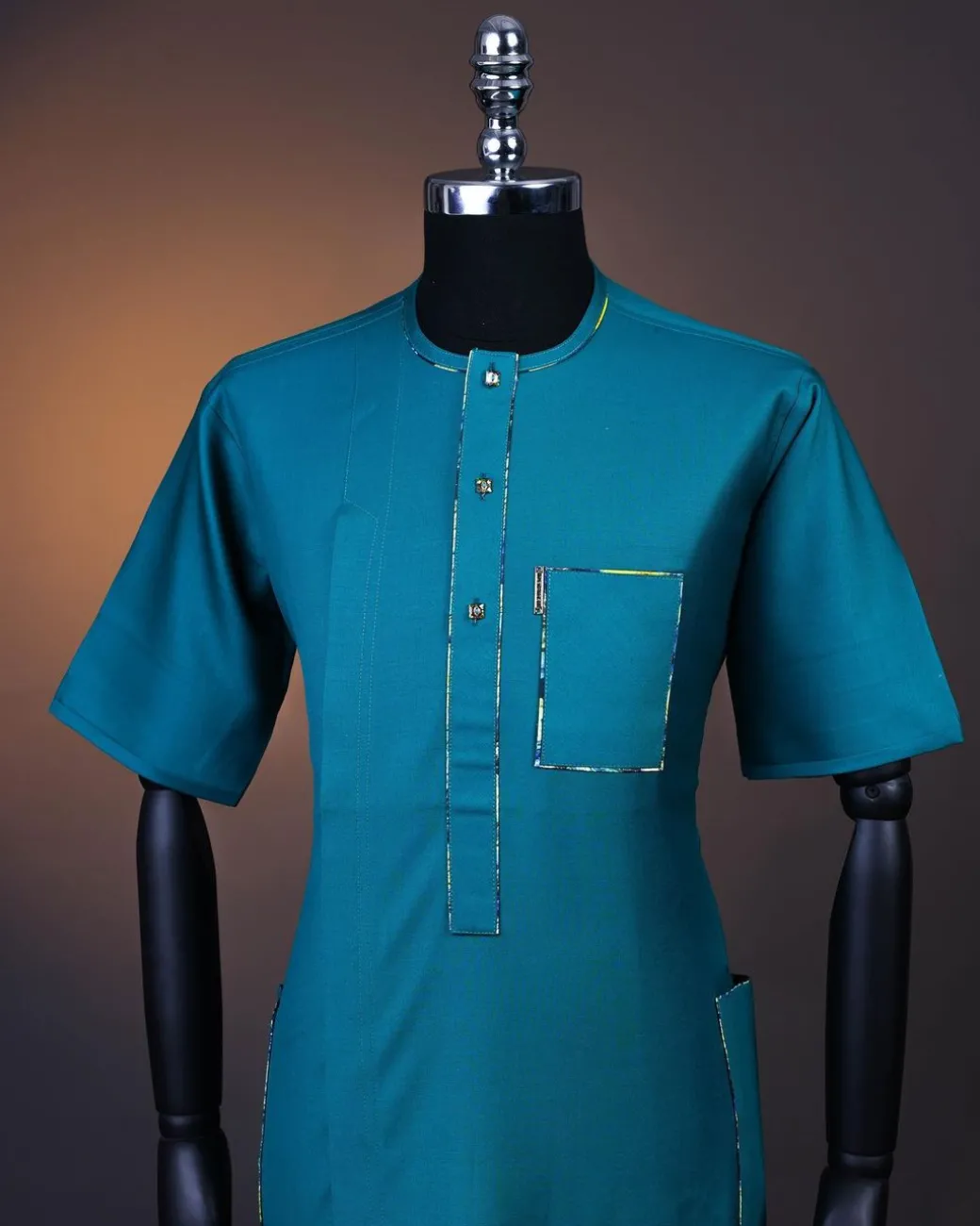 A Teal green, Front flap, patch pocket, short sleeve kaftan .