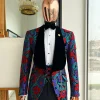 A Tomato Red,fern green, purple and black mix metallic jacquard, shawl lapel tuxedo suit