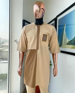 A tortilla and peanut brown, gold metallic jacquard detailing African traditional senator kaftan native