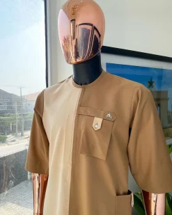 A Tortilla and peanut brown combat front and side pocket with a clear view of Swarovski stone detailing African traditional senator Kaftan native.