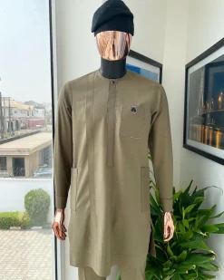 A Tortilla brown, black Swarovski button with purple paisley detailing with side patch pocket african traditional senator kaftan native.