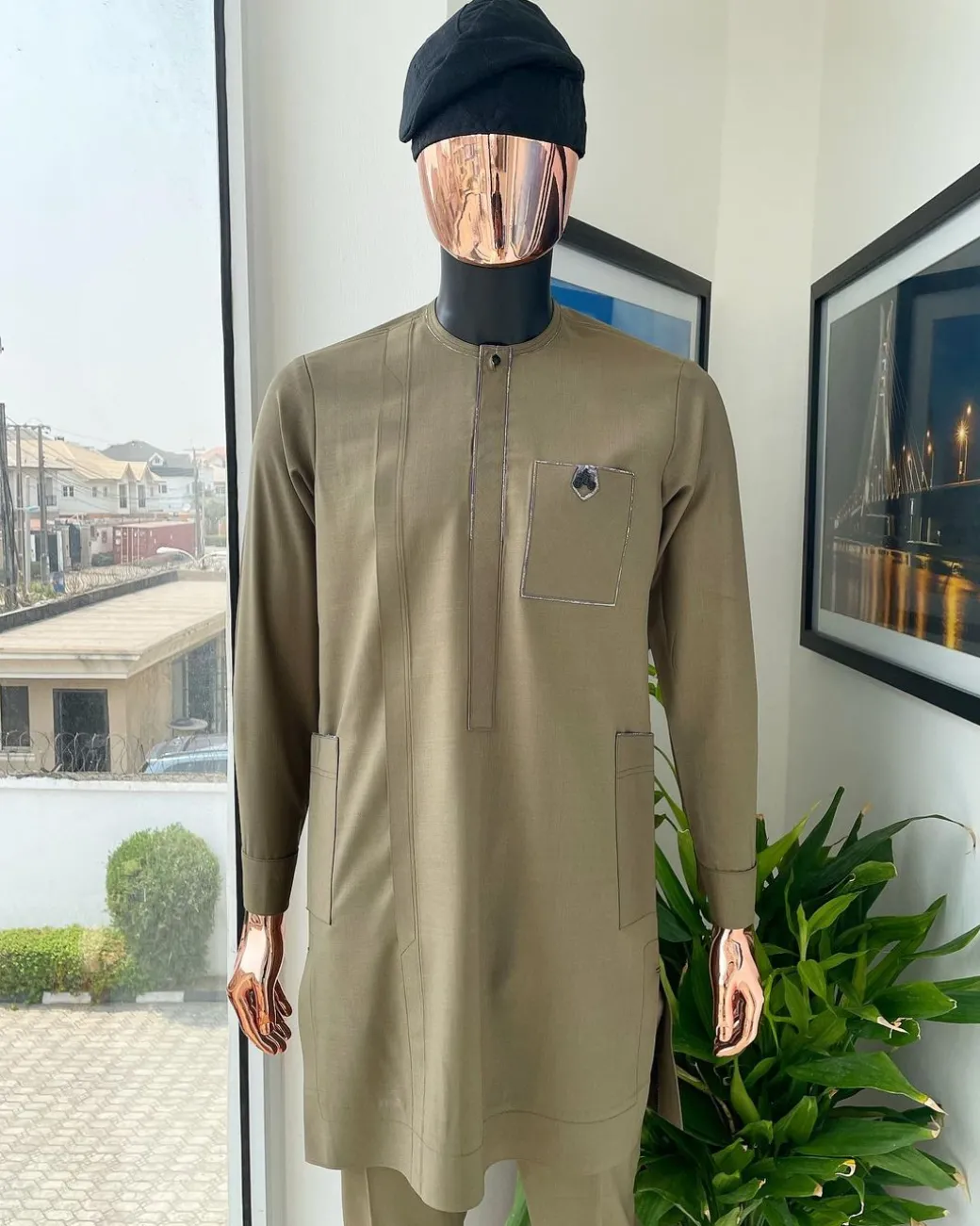 A Tortilla brown, black Swarovski button with purple paisley detailing with side patch pocket african traditional senator kaftan native.