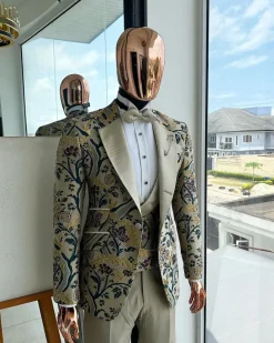 A Tortilla brown, emerald green, gold and splash of burgundy metallic floral jacquard peak lapel tuxedo suit