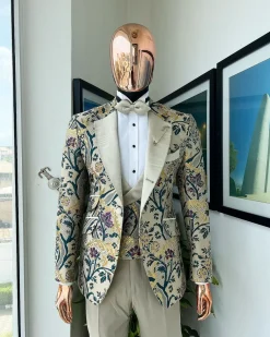 A Tortilla brown, emerald green, gold and splash of burgundy metallic floral jacquard peak lapel tuxedo suit