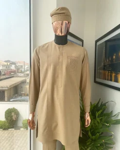 A tortilla brown, front flap, and ruffle pocket detail African traditional senator kaftan native