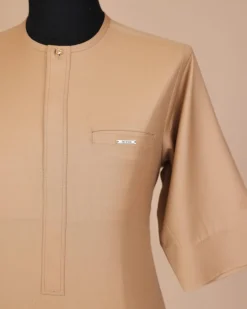 A Tortilla brown, front flap with Swarovski button, 3/4 sleeve African senator kaftan native.