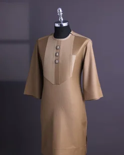 A Tortilla brown, invisible zip, black connected metal tag, 3/4 sleeve traditional african senator kaftan native.