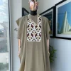 A Tortilla brown, layered tettri pattern embroidery detailing agbada