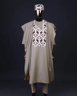 A Tortilla brown, layered tettri pattern embroidery detailing agbada