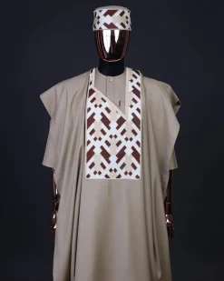 A Tortilla brown, layered tettri pattern embroidery detailing agbada