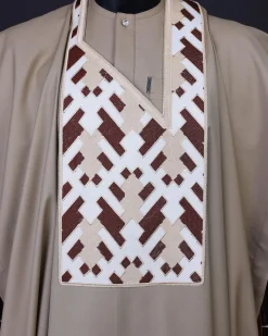 A Tortilla brown, layered tettri pattern embroidery detailing agbada