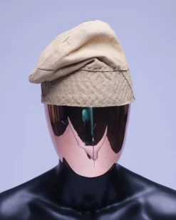 A Tortilla brown Yoruba traditional hat/Fila.