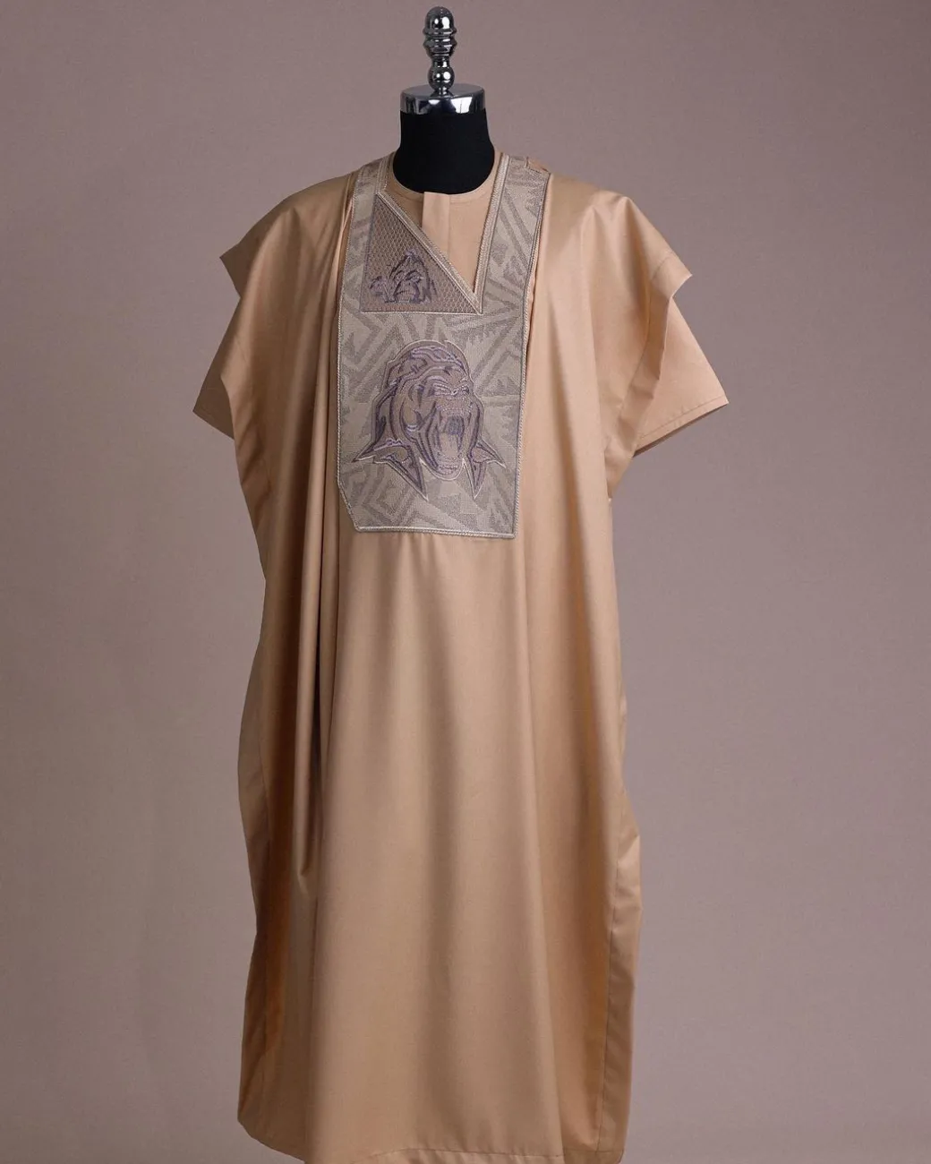 A Tortilla town, roaring godzilla metallic wire embroidery details Agbada