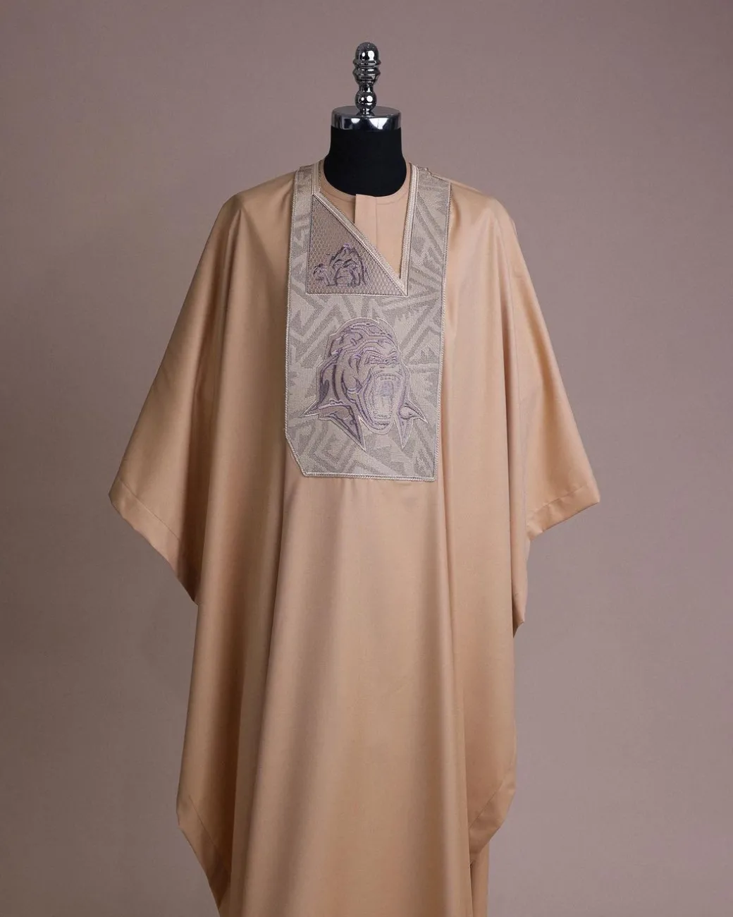 A Tortilla town, roaring godzilla metallic wire embroidery details Agbada