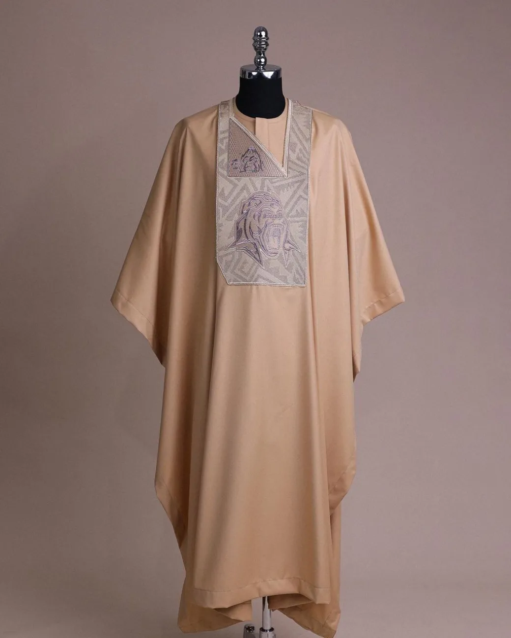 A Tortilla town, roaring godzilla metallic wire embroidery details Agbada