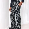 A trumpet cut, floral jacquard, high waist, Gurkha pant with side metal adjuster tuxedo pant