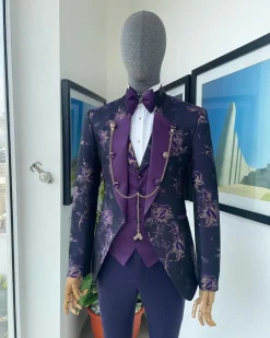 A “Vicar” Eggplant purple with a splash of gold floral metallic jacquard tuxedo suit