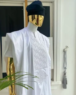 A voil jacquard cocaine white with an aligned square pattern design Agbada