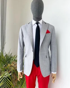 A “Whatever” Irish grey peak lapel with black stripe neck 1 button suit