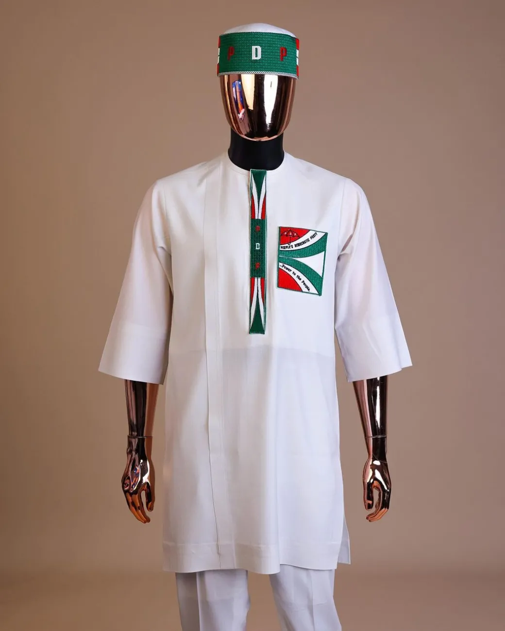 A white , PDP (People Democratic Party) pattern embroidery, 3/4 sleeve African senator kaftan native.