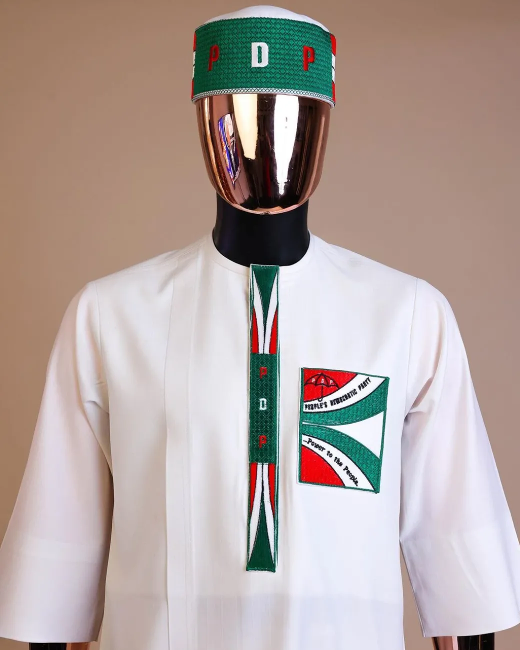 A white , PDP (People Democratic Party) pattern embroidery, 3/4 sleeve African senator kaftan native.