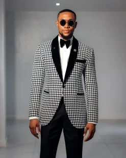 A White and black houndstooth, velvet shawl lapel tuxedo suit