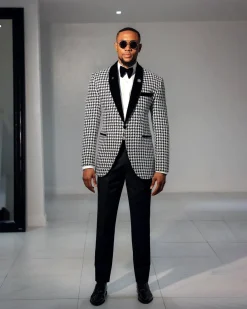 A White and black houndstooth, velvet shawl lapel tuxedo suit