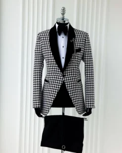 A White and black houndstooth, velvet shawl lapel tuxedo suit